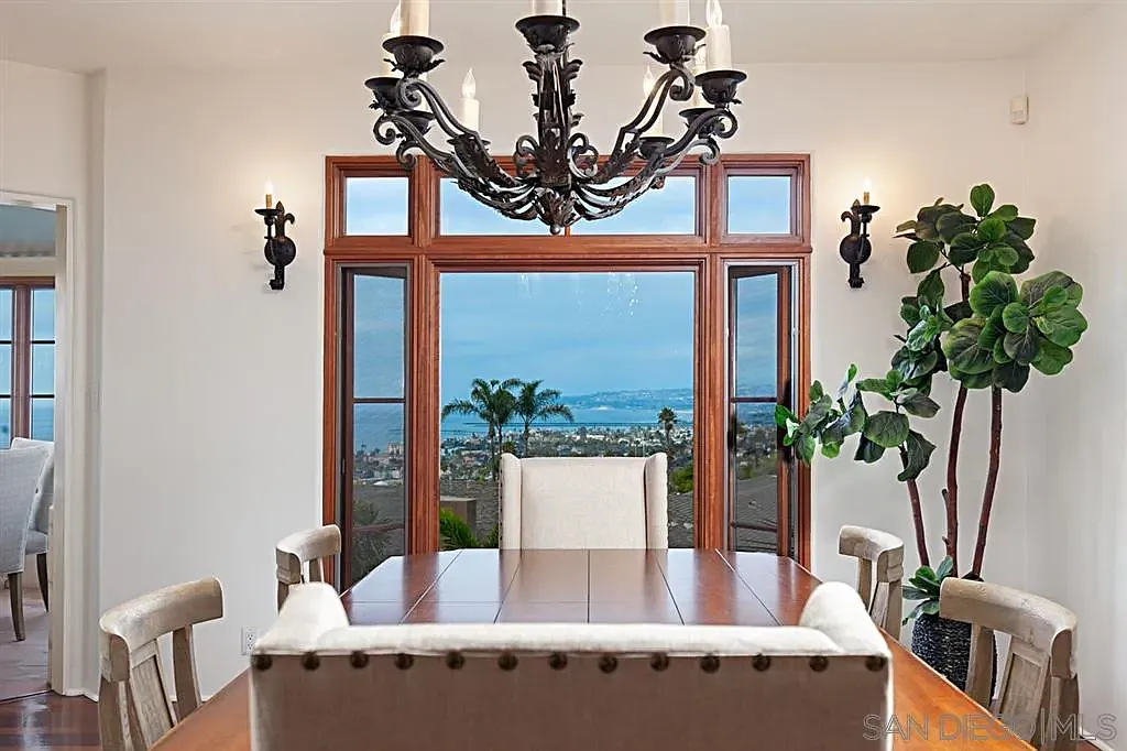 Large windows overlooking San Diego Bay from the interior of 1135 Barcelona Drive