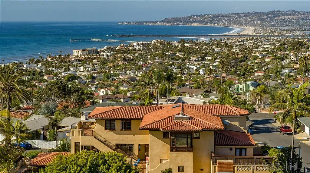Aerial view of San Diego Bay and residential neighborhood near 1135 Barcelona Drive
