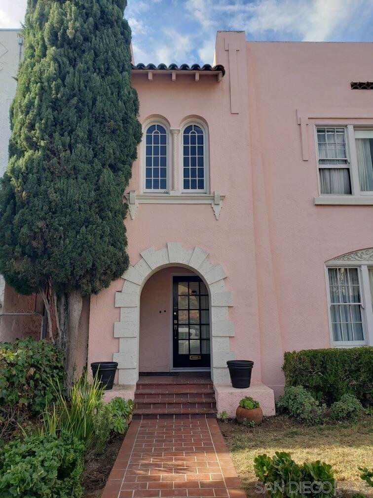 Pink stucco residential building at 3418–3420 Park Boulevard in San Diego