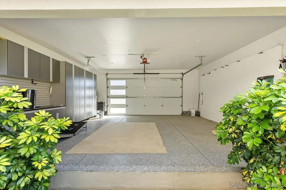 Spacious residential garage with storage cabinets at 4515 Tivoli Street