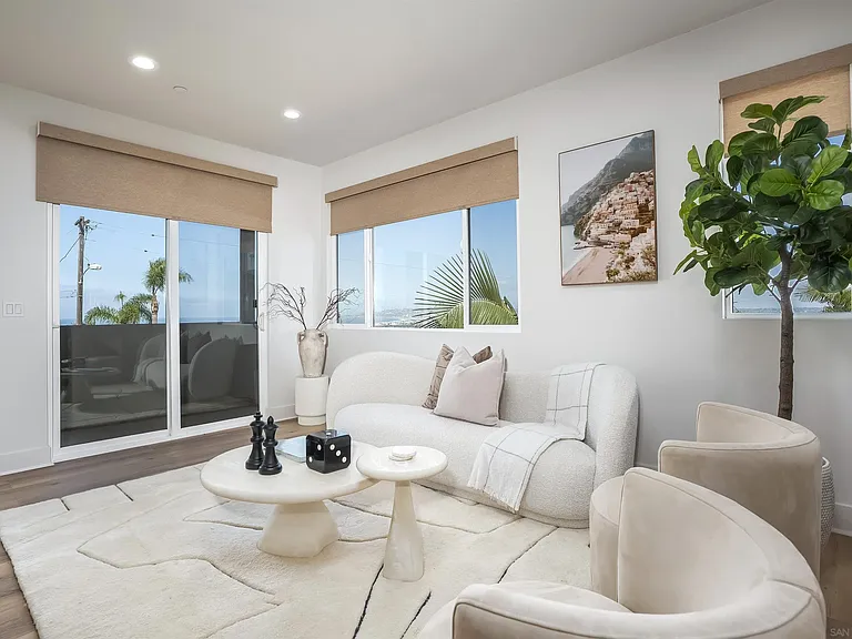 Bright living room with contemporary furnishings at 4593 Coronado Avenue