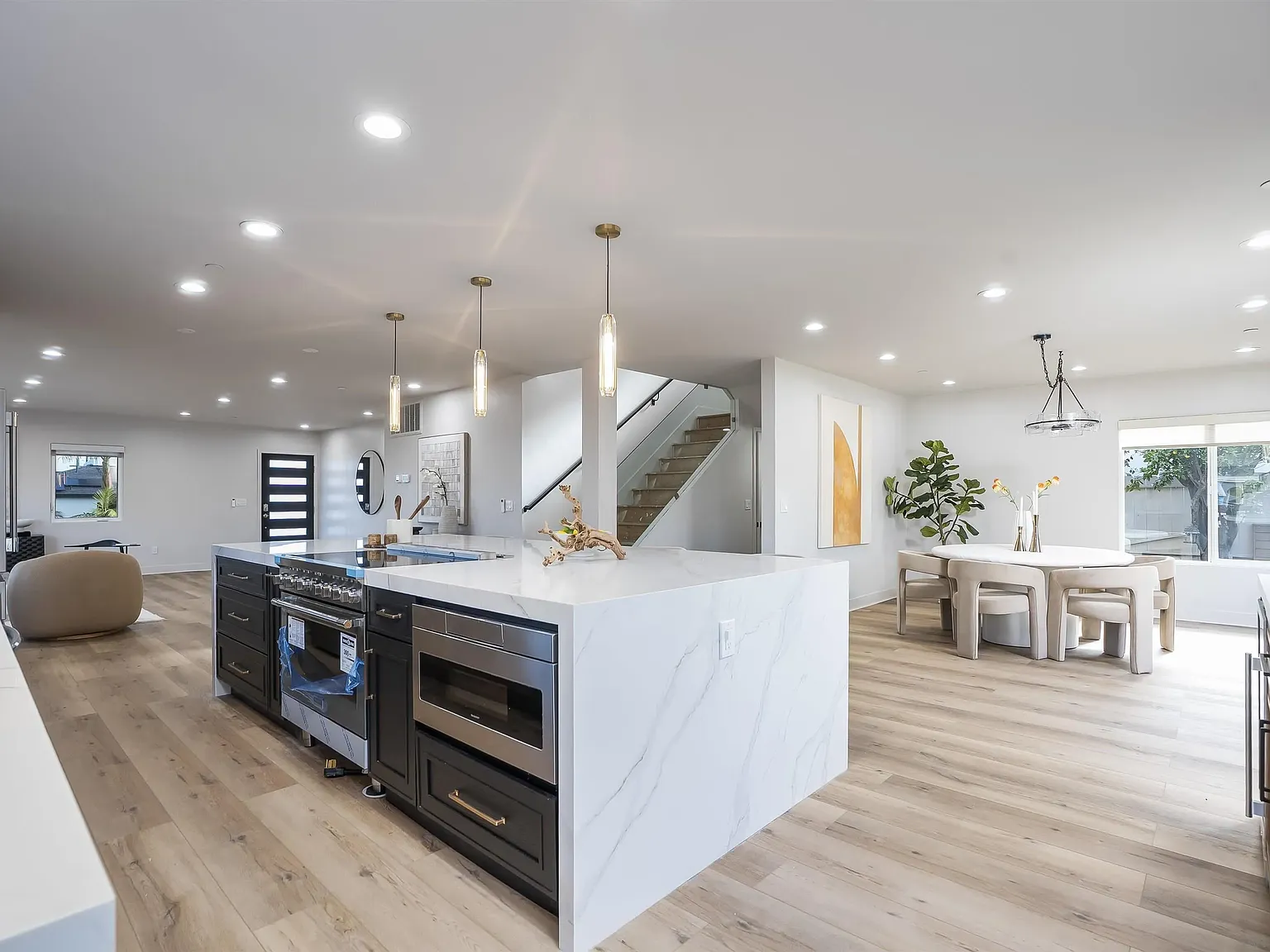 Open-concept kitchen and living space at 4593 Coronado Avenue in San Diego
